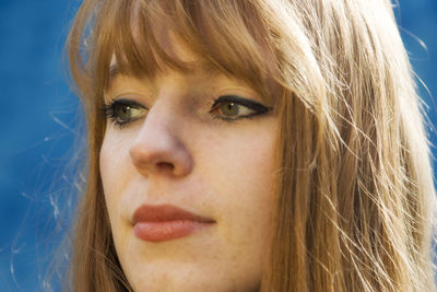 Close-up portrait of young woman