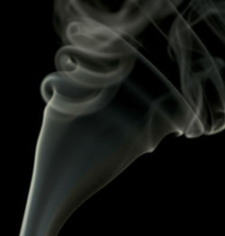 Close-up of smoke against black background