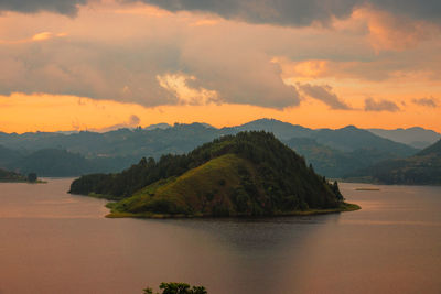 View of islands at lake mutanda at sunset seen from the skeleton island in kisoro town, uganda