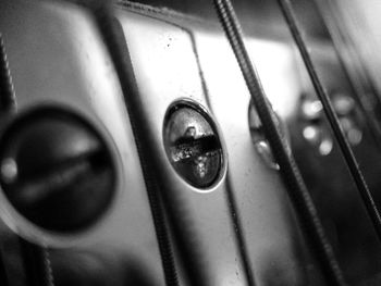 Close-up of water drops on metal