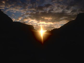 Scenic view of cloudy sky at sunset