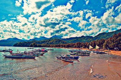 Scenic view of sea against cloudy sky