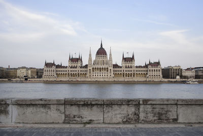 Government building in city against sky