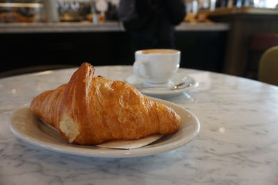 Close-up of breakfast served on table