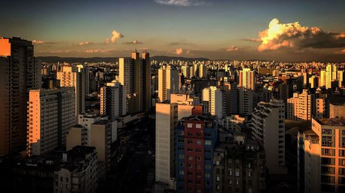 Aerial view of cityscape against sky