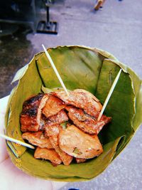 High angle view of food in leaves on table