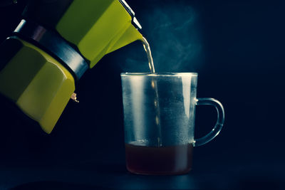 Close-up of coffee cup on table