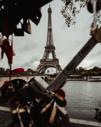 Tower bridge over river with city in background