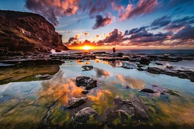 Scenic view of sunset over sea