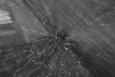 Full frame shot of wet spider web in rainy season