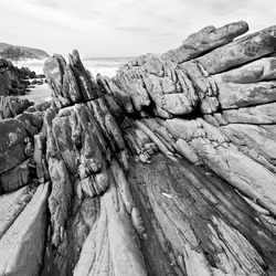 Panoramic view of rock formations against sky