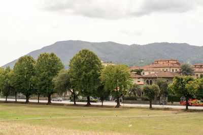 Scenic view of landscape against cloudy sky