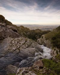 Scenic view of rocky mountains against sky