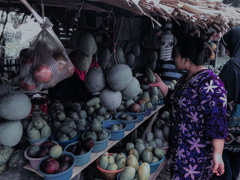 Various fruits for sale at market stall