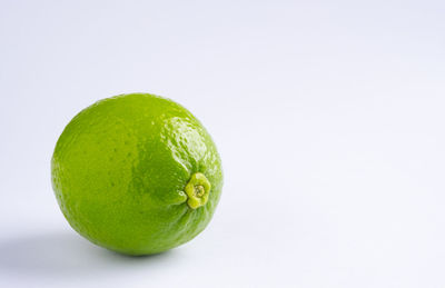 Close-up of fruits against white background