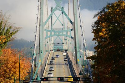 View of bridge in city during autumn