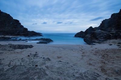 Scenic view of beach against sky