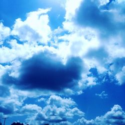 Low angle view of clouds in blue sky