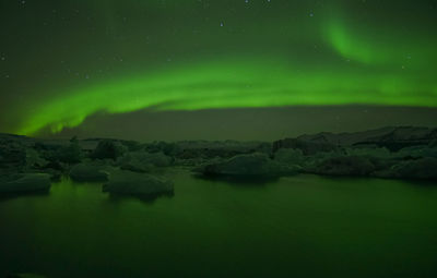 Scenic view of sea against sky at night