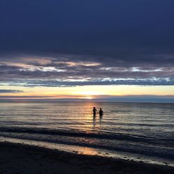 Scenic view of sea at sunset