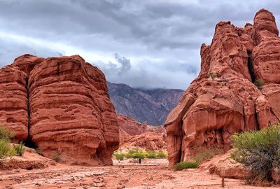 Rock formations on mountain against sky