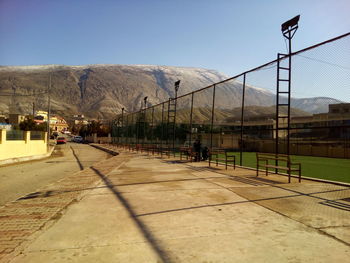 Fence against clear sky