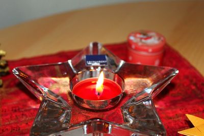 High angle view of red wine glasses on table