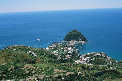 Scenic view of sea against blue sky