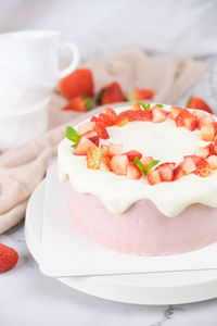 Close-up of cake served on table