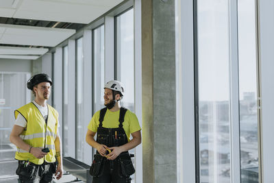 Men talking at construction site