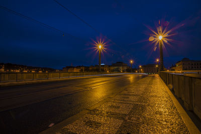 Illuminated street light at night