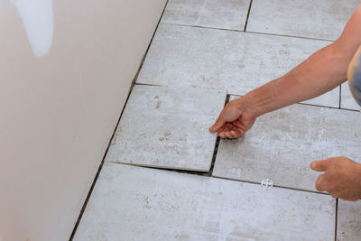 Cropped hand of person holding paper