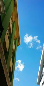 Low angle view of building against blue sky