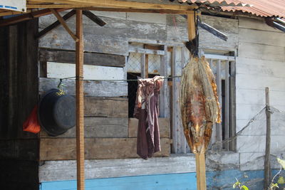 Clothes drying on roof against building