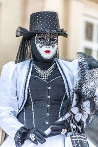 Portrait of woman wearing mask during carnival