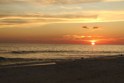 Scenic view of beach during sunset