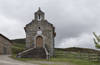 Low angle view of old building against sky