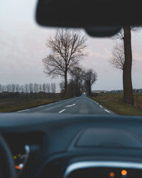 Road seen through car windshield