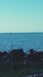 Scenic view of sea against clear sky