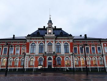 Facade of building against sky