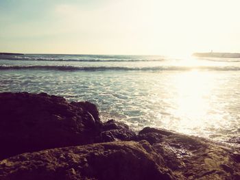 Scenic view of sea at sunset