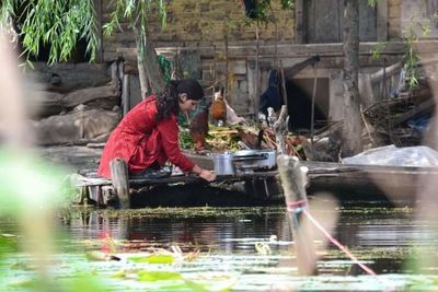 Reflection of man in water