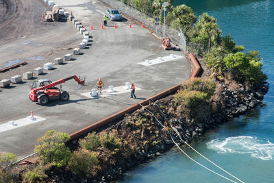 High angle view of people on road by sea