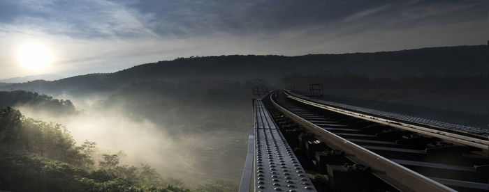 High angle view of railroad bridge against sky