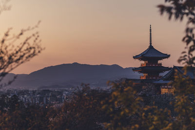 View of buildings against sky during sunset