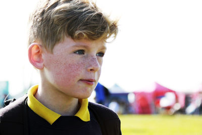 Close-up of boy looking away