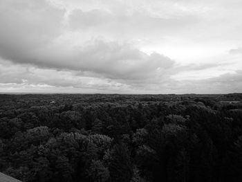 Scenic view of cloudy sky over field