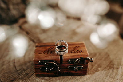 Close-up of clock on table