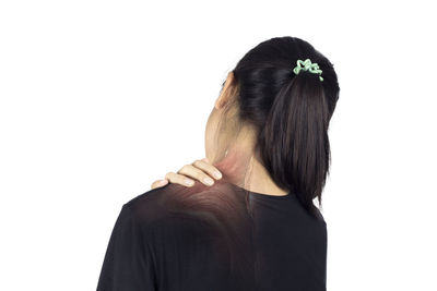 Rear view of woman against white background