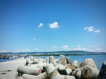 Panoramic view of sea against blue sky